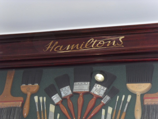 Applied gold leaf to parts of missing lettering