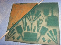 Brushes removed for cleaning and removing faded felt